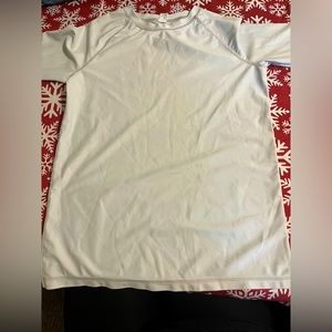 White athletic long sleeve under shirt